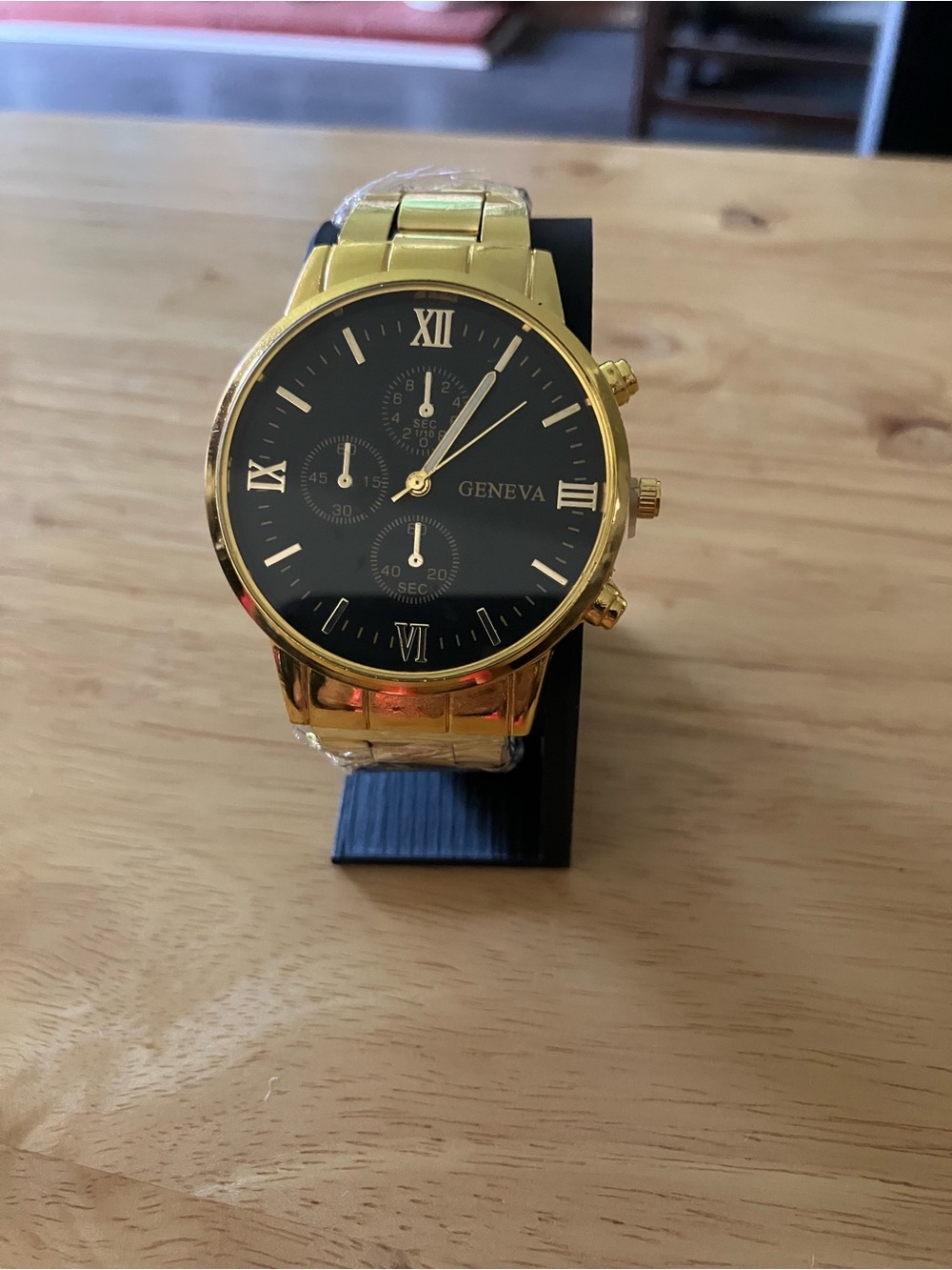 Geneva Gold Tone Watch with Black Dial